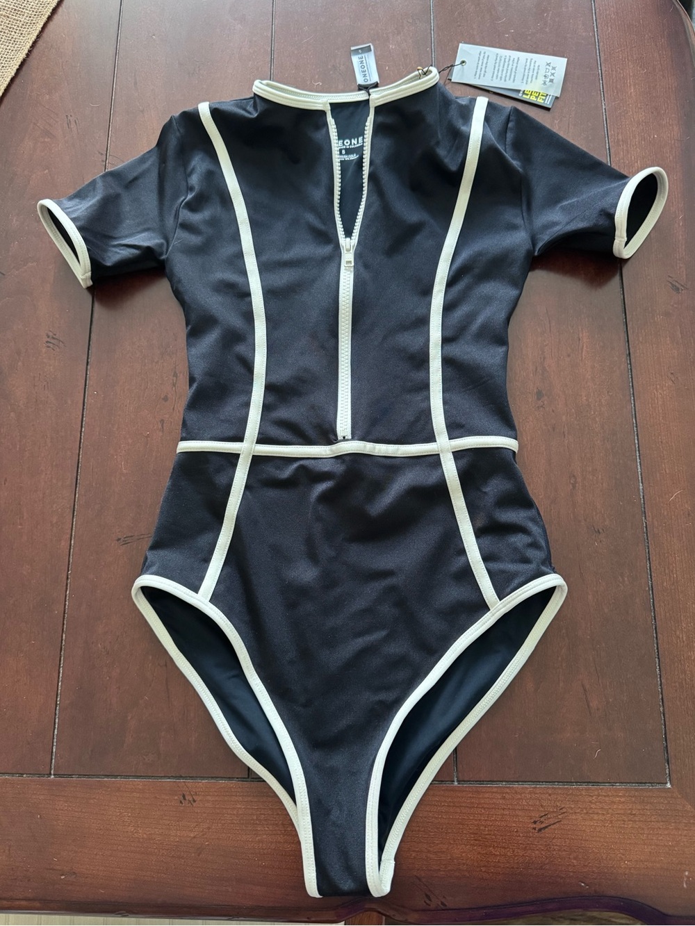 Black One-Piece Swim Suit with Cream Trim by ONEONE Swim